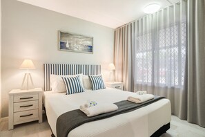 2 habitaciones, cortinas blackout y tabla de planchar con plancha 