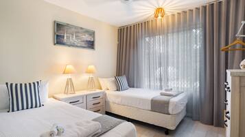 Apartment, 2 Bedrooms | 2 bedrooms, blackout drapes, iron/ironing board, free WiFi