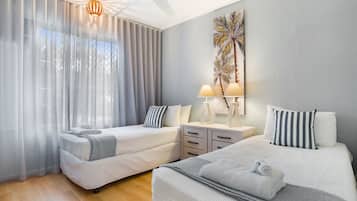 Apartment, 2 Bedrooms | 2 bedrooms, blackout drapes, iron/ironing board, free WiFi