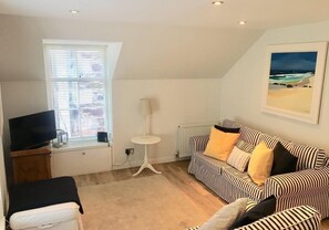 Apartment | Wohnbereich | Flachbildfernseher