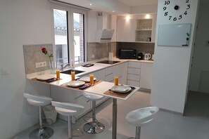 Microwave, dishwasher, coffee/tea maker, high chair - ecoSmart Apartments Superior (Granada)