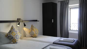 Habitación estándar con 1 cama matrimonial o 2 individuales | Escritorio, wifi gratis y ropa de cama