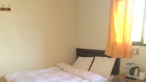 Family Triple Room | Blackout drapes, bed sheets - CHOU Hotel (Taoyuan City)