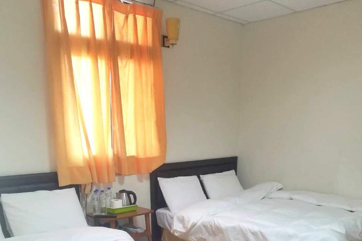 Family Quadruple Room | Blackout drapes, bed sheets
