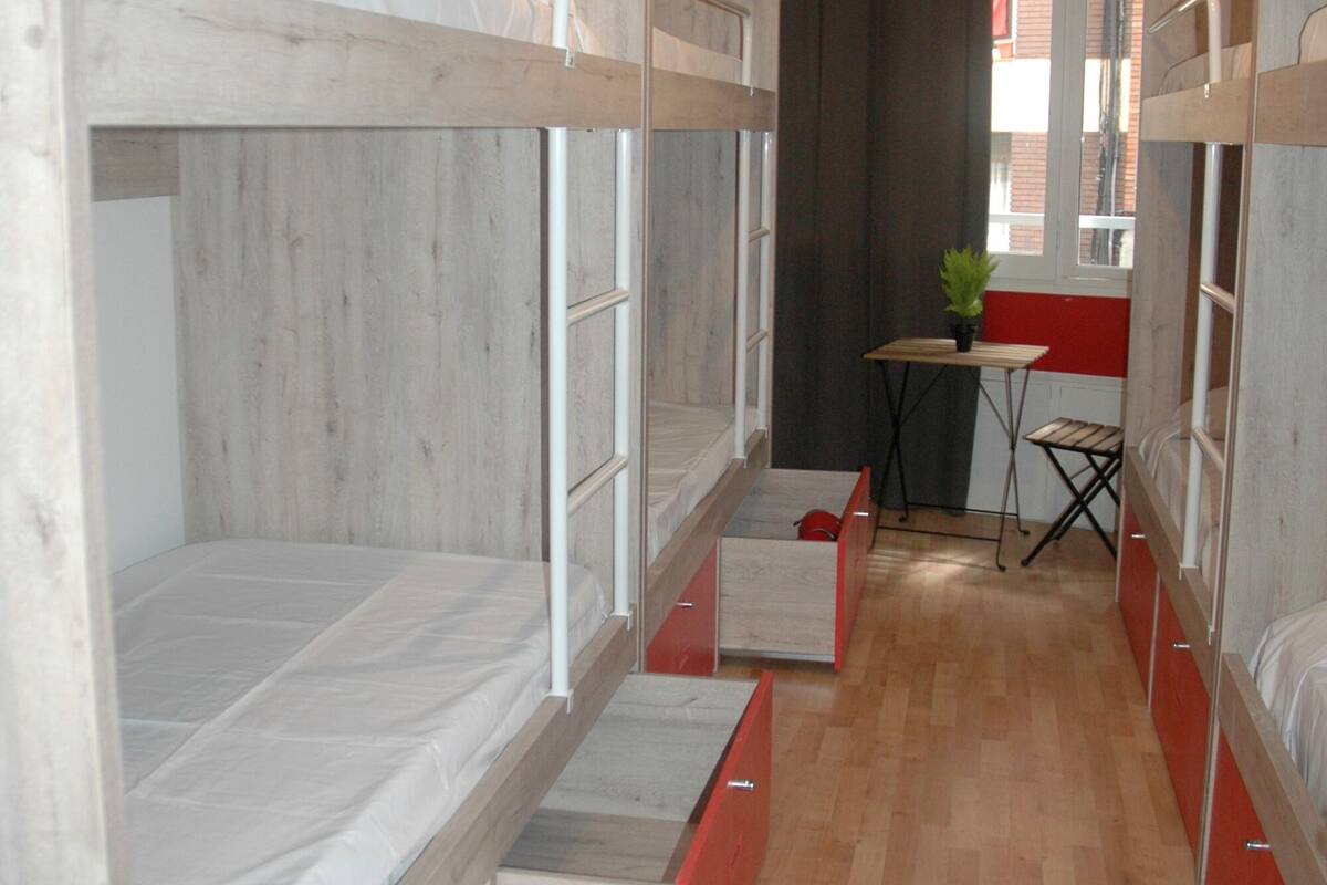 Shared Dormitory, Women only (1 bed in a 8-Bed Dormitory Room) | Soundproofing, WiFi (free), bed sheets