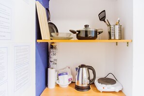Apartment | Private kitchenette | Stovetop, electric kettle, cookware/dishes/utensils - Gordon Beach Apartments (Tel Aviv)