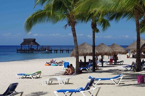 On the beach, sun loungers
