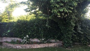 Chambre Triple, vue jardin (Uno) | Vue de la chambre