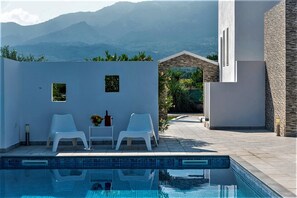 Outdoor pool, sun loungers