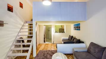 Apartamento, 1 quarto | Área de estar