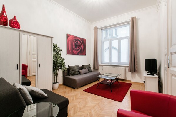 Apartment, 1 Bedroom | Living area | Flat-screen TV