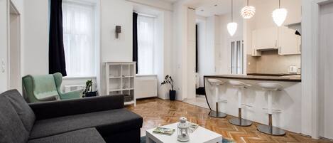 Apartment, 1 Bedroom | Living area | Flat-screen TV