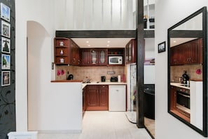 Apartment, 2 Bedrooms | Private kitchen | Fridge, microwave, stovetop, electric kettle