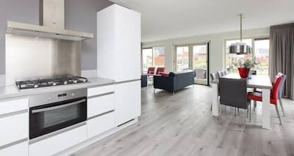 Stay in our spacious Sneekermeer 8 home with private jetty.