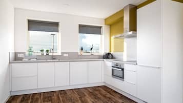 Refrigerador, microondas, lavavajillas y comedor