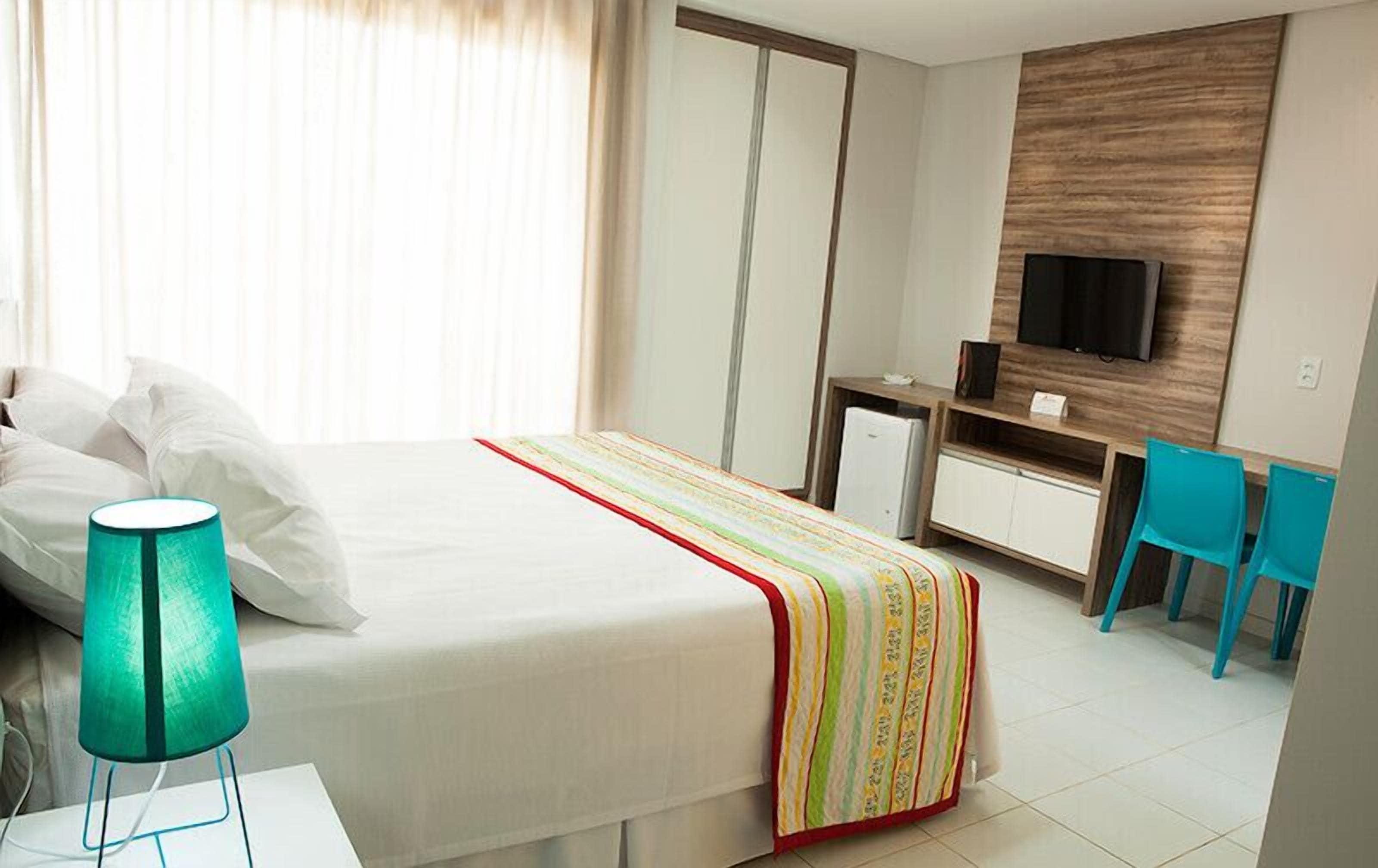 Quarto luxo | Frigobar, cofres nos quartos, Wi-Fi de cortesia, roupa de cama