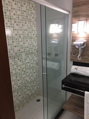 Shower, hair dryer, towels, soap