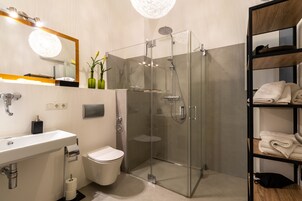 Deep soaking tub, rainfall showerhead, free toiletries, hair dryer