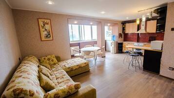 Apartment | Wohnbereich | Flachbildfernseher