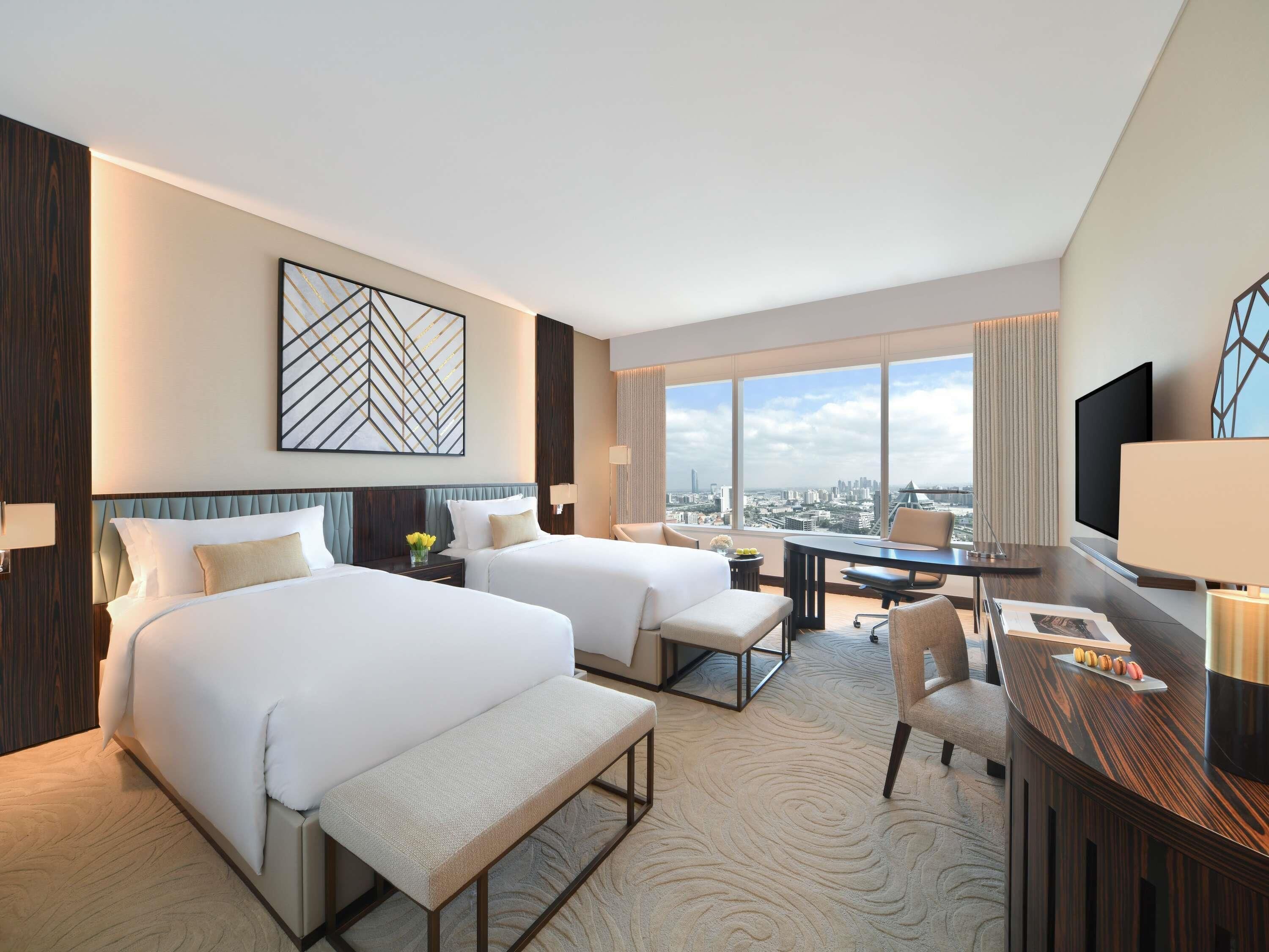 Premium bedding, pillow-top beds, minibar, in-room safe