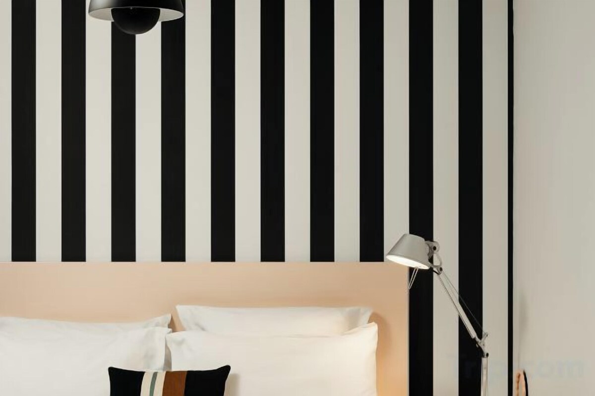 Premium bedding, desk, blackout drapes, soundproofing
