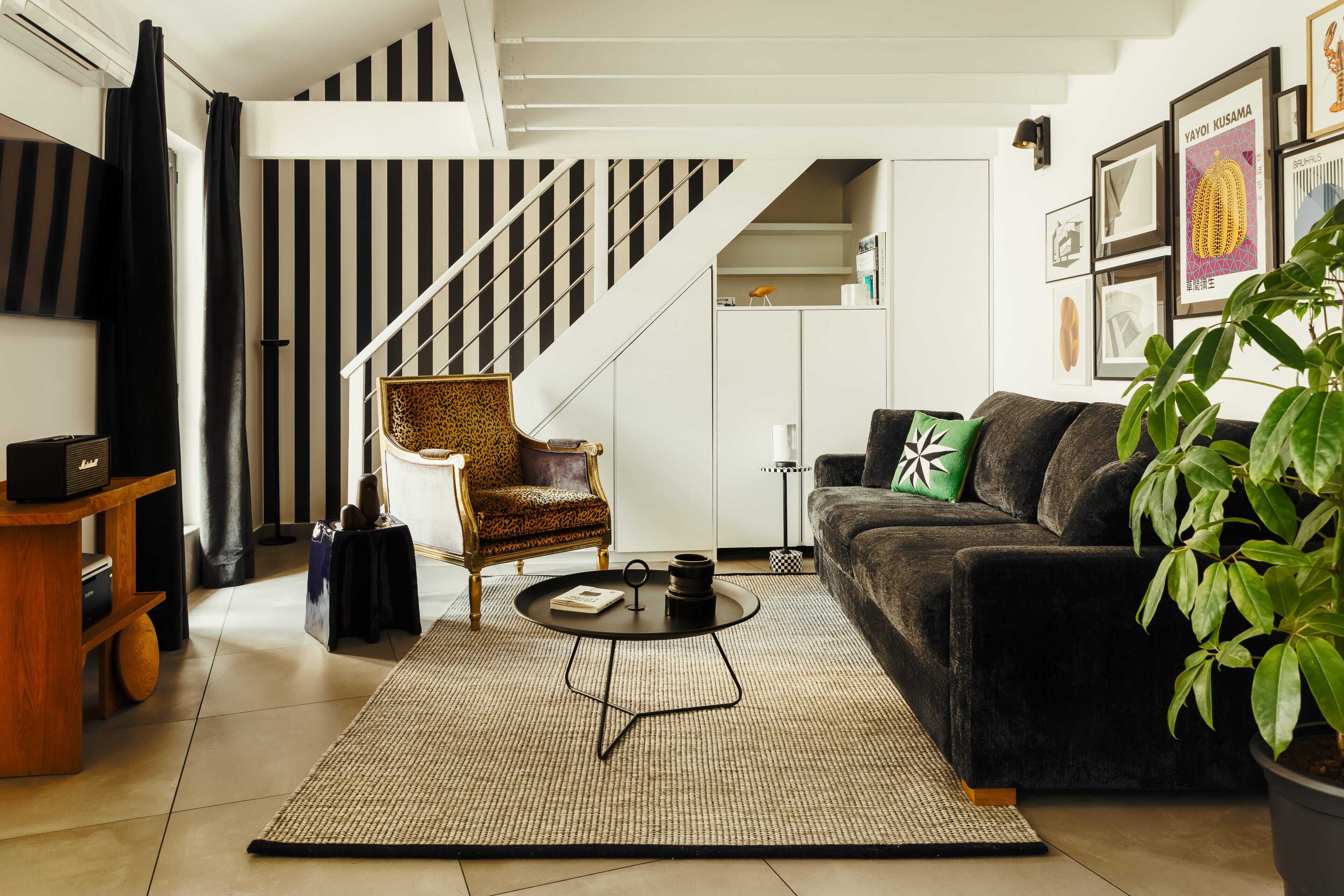 1-BR Loft Apartment | Living area | 49-inch Smart TV with cable channels, TV, iPod dock