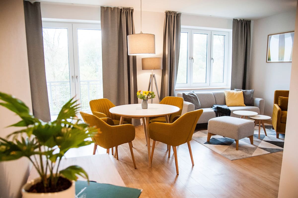 Apartment, Balcony (2) | Living area | 75-inch flat-screen TV with satellite channels, Smart TV, fireplace