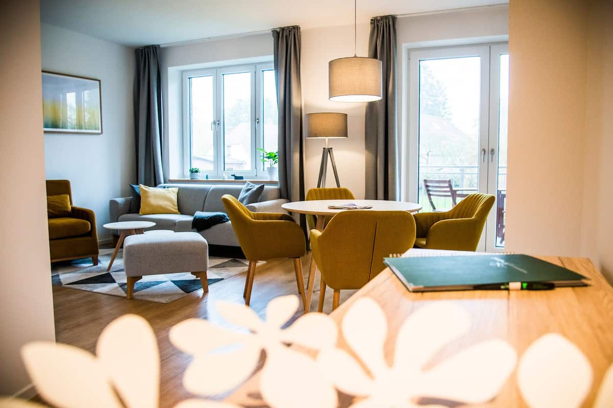 Apartment, Balcony (1) | Living area | 75-inch flat-screen TV with satellite channels, Smart TV, fireplace