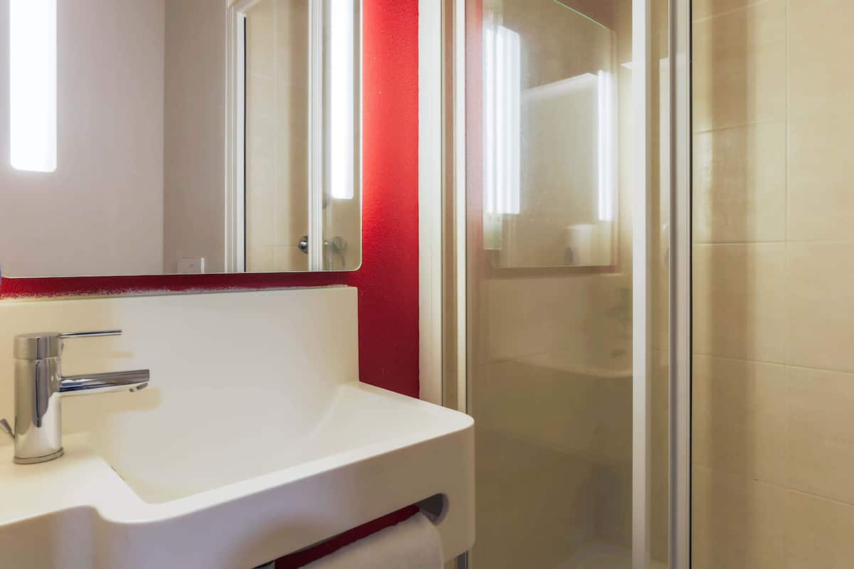 shower, towels, soap, toilet paper