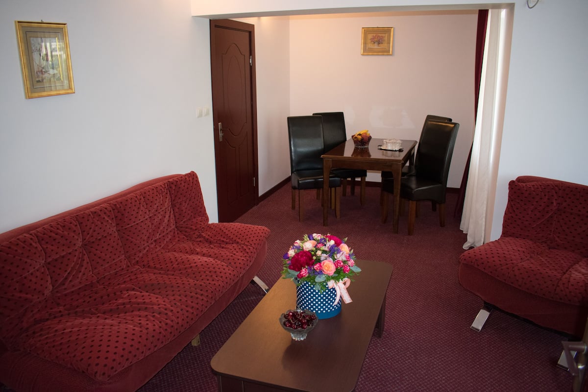 Standard Apartment, 2 Bedrooms | Living room | Flat-screen TV
