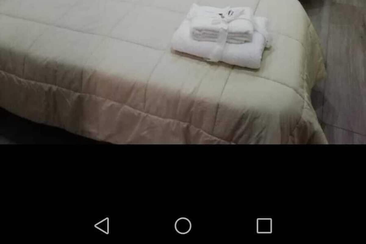 Twin Room, Shared Bathroom | Minibar, free WiFi, bed sheets