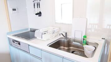 Fridge, microwave, stovetop, cookware/dishes/utensils