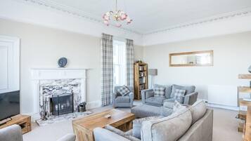 Luxury Apartment | Living area | LCD TV, DVD player