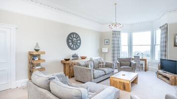 Luxury Apartment | Living area | LCD TV, DVD player