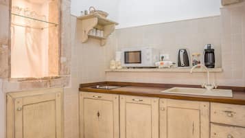 Estudio (Orlando) | Cocina privada | Refrigerador, microondas, parrilla de estufa y lavavajillas