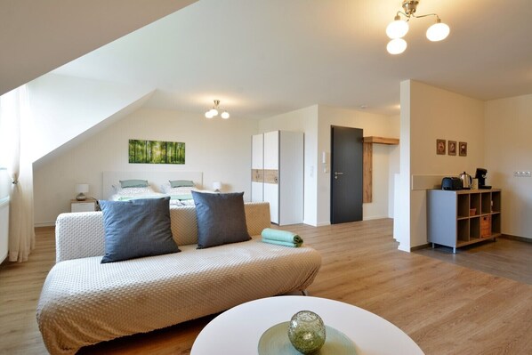 Comfort Apartment | Living area | 107-inch LED TV with satellite channels, TV