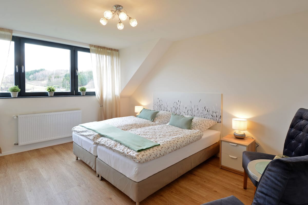 1 bedroom, premium bedding, laptop workspace, soundproofing
