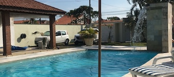 Itanhaém Wonderful Huge Pool<br>Billiards, Wi-Fi, Sky, Lawn, Alarm <br><br>
