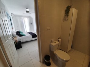 Shower, towels, toilet paper