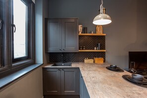 Deluxe Studio | Private kitchen | Fridge, microwave, oven, stovetop