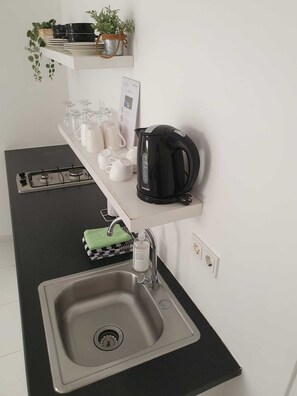 Fridge, microwave, coffee/tea maker, electric kettle