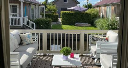 Stay in our cozy Meine 4 chalet with private jetty.