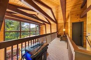 Enjoy a serene atmosphere with a view of lush greenery from the large window, and sit on the bench to take it in.