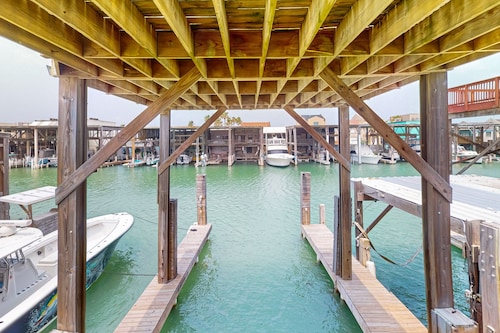 Waterfront home w/ a spacious deck, boat slip, & fish cleaning station - dogs OK