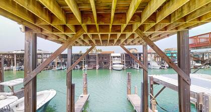 Waterfront home w/ a spacious deck, boat slip, & fish cleaning station - dogs OK