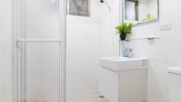 Shower, hair dryer, towels, soap