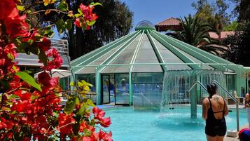 2 outdoor pools, open 9:30 AM to 8:00 PM, pool umbrellas
