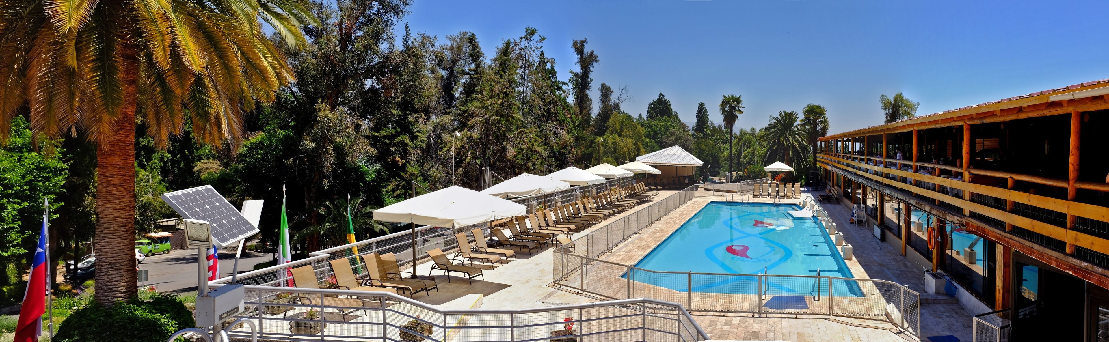 2 outdoor pools, open 9:30 AM to 8:00 PM, pool umbrellas