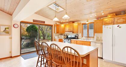 Spacious home under a mile to Douglas Beach Great for families or groups