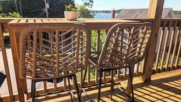 Relax on the deck with two comfortable chairs and take in the serene view of the water and surrounding landscape.